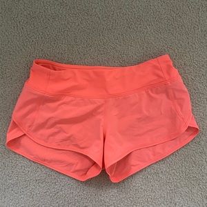 Neon orange lululemon shorts
